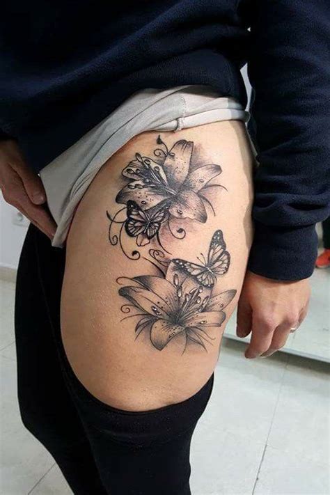 female thigh and hip tattoos